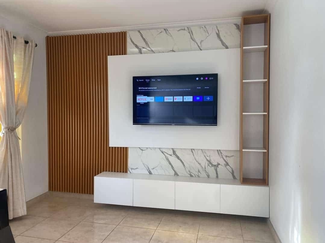 Living room before custom floating TV unit and media wall installation in Gauteng by Elite Wood Works